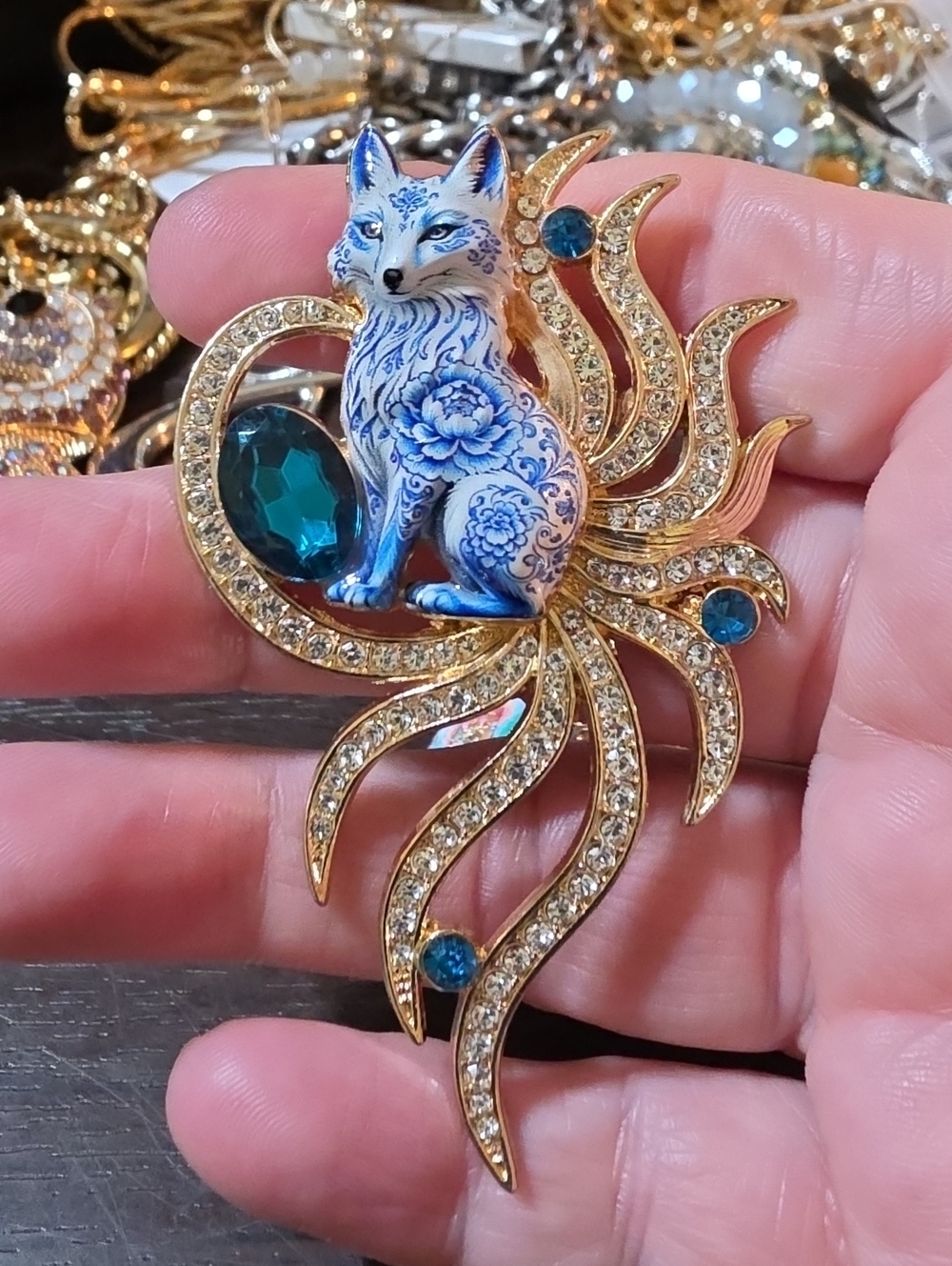 A179- Gold-Plated Blue Fox Brooch with Teal Crystal Accents